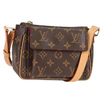 Louis Vuitton Tweedehands Canvas Louis Vuitton tassen - Dames - Pre-owned - Bruin - Maat: ONE Size Leer