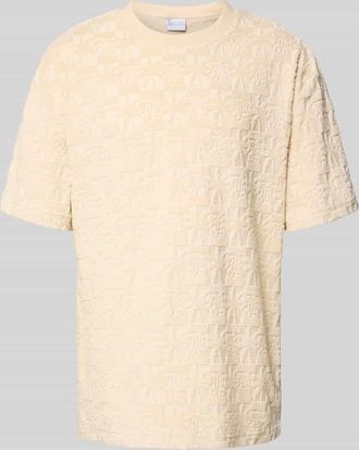 Karl Kani T-Shirt im Allover-Look mit Rundhalsausschnitt in Sand, Größe XXL