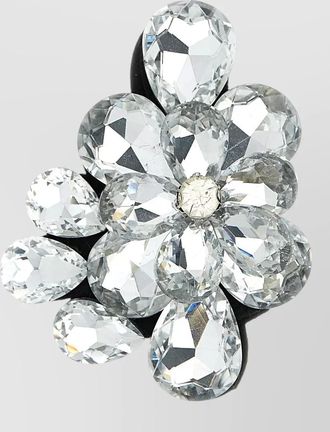 Le Twins crystal floral brooch featuring faceted stones
