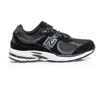 New Balance Zwarte leren unisex sneakers - Dames - Schoenen - Grijs - Maat: 36 EU Synthetisch