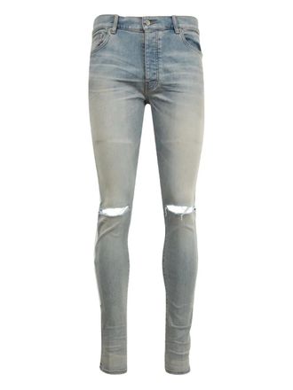 Amiri Bones-appliqué distressed skinny jeans - men - Cotton/Elastomultiester/Elastane - 32 - Blue