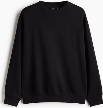 H&M THERMOLITE Sweatshirt in Loose Fit - Schwarz