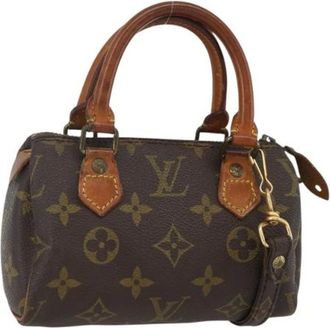 Louis Vuitton Pre-owned Mini Bags, female, Brown, Size: ONE SIZE Pre-owned Canvas Mini Bag