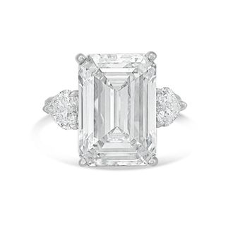 Diana M. Jewels Platinum Lab grown 8ct Emerald diamond ring with heart diamonds on the side and micropave band