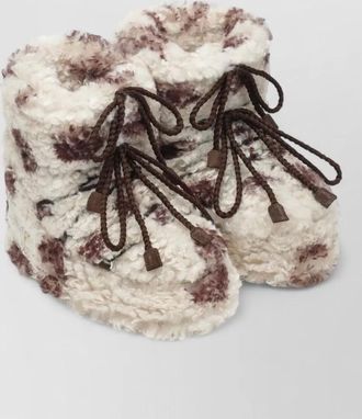 Moon Boot curly cow print boots