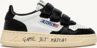Autry MEDALIST KIDSTRIPES LOW SNEAKERS IN WHITE AND BLACK LEATHER WITH LETTERING