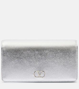 Valentino Garavani VLogo Mini metallic leather clutch