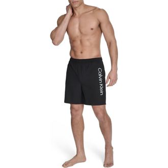 Calvin Klein Solid Stretch Volley Swim Shorts in Black at Nordstrom Rack, Size Xx-Large