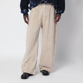 Balenciaga Jeans beige effetto vissuto con strappi