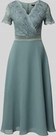 Swing Cocktailkleid mit Spitze und V-Ausschnitt in Lind, Größe 34