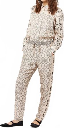 Me369 Ember Blossom Print Tapered Leg Track Pants In Tan