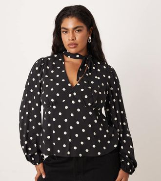 Nobody's Child Blusa nera a pois bianchi con sciarpa sul collo-Nero