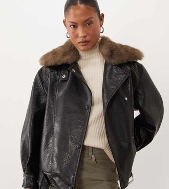 Asos Petite ASOS DESIGN Petite giacca biker effetto pelle con colletto in pelliccia sintetica color cuoio nera-Nero
