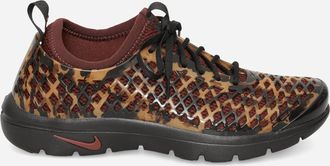 Nike Women s Rejuven8 Run Sneakers Barkroot Brown