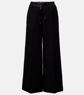 Alaia Ala&iuml;a Leather-trimmed virgin wool wide-leg pants
