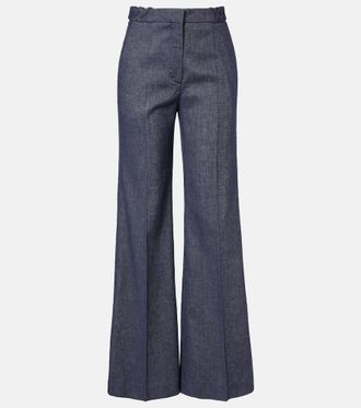 Dorothee Schumacher Pantalones flared Fluid de denim