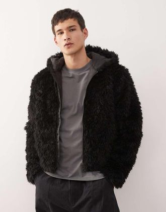Weekday Giacca in pelliccia sintetica nera con cappuccio-Nero