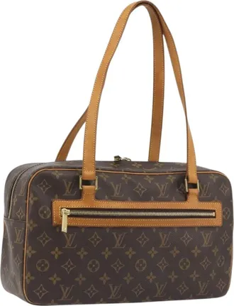 Louis Vuitton Cite Monogram Canvas Brown Canvas Handbag (Pre-Owned)