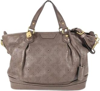 Louis Vuitton Pre-owned Handbags, female, Brown, Size: ONE SIZE Pre-owned Mahina Tote