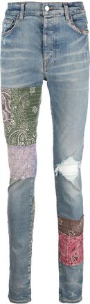 Amiri distressed patchwork skinny jeans - men - Cotton/Elastane/Polyester - 28 - Blue