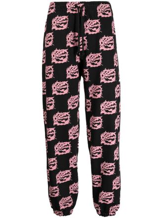 Rassvet graphic-print cotton track pants - Black