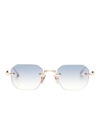 Akoni square-frame sunglasses - unisex - Titanium - 47 - Gold