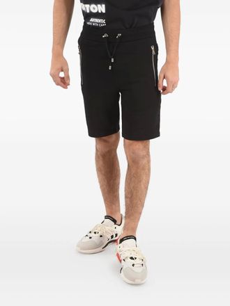 Balmain logo-band zip-detail shorts - men - Cotton - 44 - Black