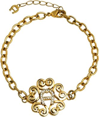 Aigner Gold Tone Crystal Logo Bracelet