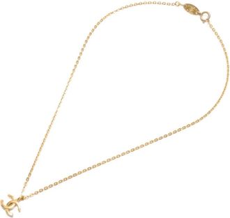 Chanel 1982 interlocking-CC pendant necklaces - Goud