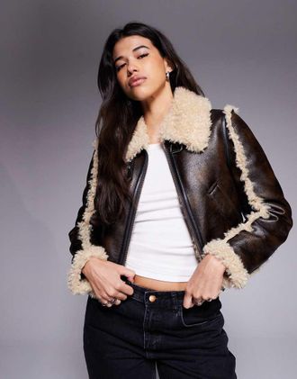 River Island Giacca biker nera con cuciture in montone sintetico-Marrone
