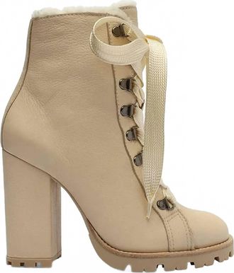 Schutz Women Faux Fur Lining Lug Sole Winter Leather Booties In Beige