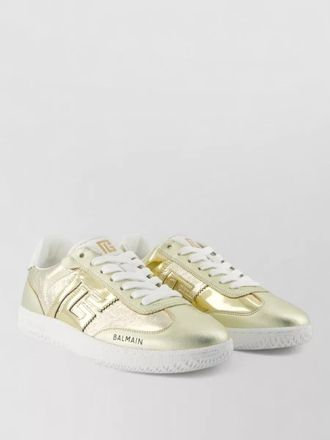 Balmain swan low top leather sneakers gold