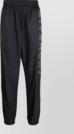 Givenchy logo track pants with side stripe detail