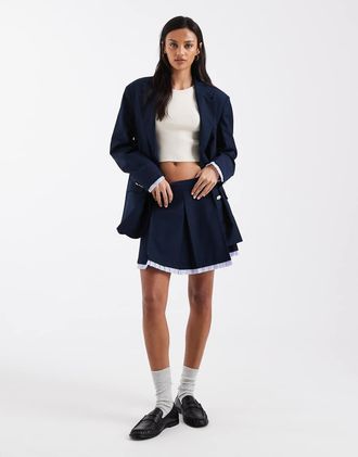 Tommy Jeans Minigonna a pieghe blu navy in coordinato