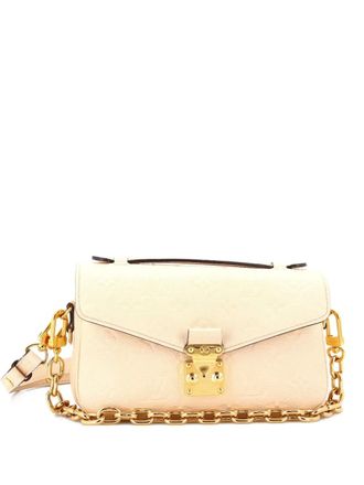 Louis Vuitton Pochette Metis Monogram Empreinte Leather East West crossbody bag - Beige