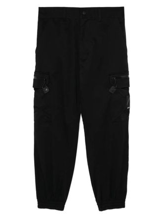 Izzue logo-patched trousers - men - Polyester - 30 - Black