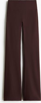H&M Ausgestellte Yogaleggings mit SoftMove - Brown