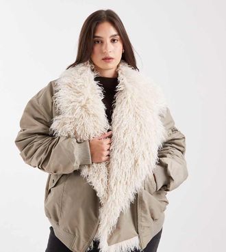 Asos Curve ASOS DESIGN Curve - Parka kaki con dettagli in pelliccia sintetica lanuginosa e tasca MA1-Verde