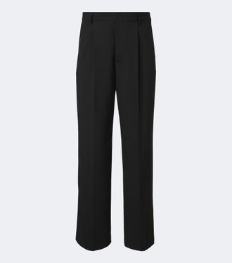 Dries Van Noten Pantaloni a gamba larga in lana pliss&eacute;