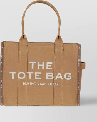 Marc Jacobs canvas travel tote featuring printed profiles