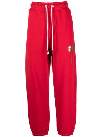 Palm Angels Pantaloni sportivi con stampa - Rosso