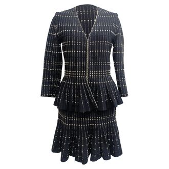 Alexander McQueen Alexander McQueen gestreept peplum vest en midi-rok set in zwarte viscose