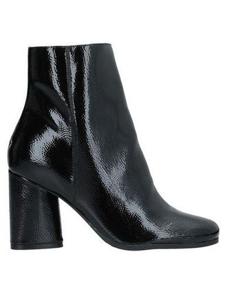 Guess CALZATURE - Stivaletti su YOOX.COM