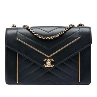 Chanel Pre-owned Tas van Lamsvel met Rits en Kettingband - Dames - Pre-owned - Zwart - Maat: ONE Size Zijde