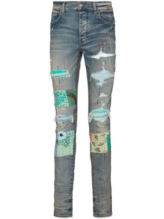 Amiri quilted patch-detail slim-fit jeans - Blue