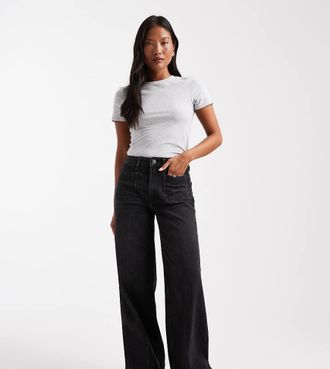 Asos Petite ASOS DESIGN Petite - Jeans a vita alta con fondo ampio neri con tasche sul davanti-Nero