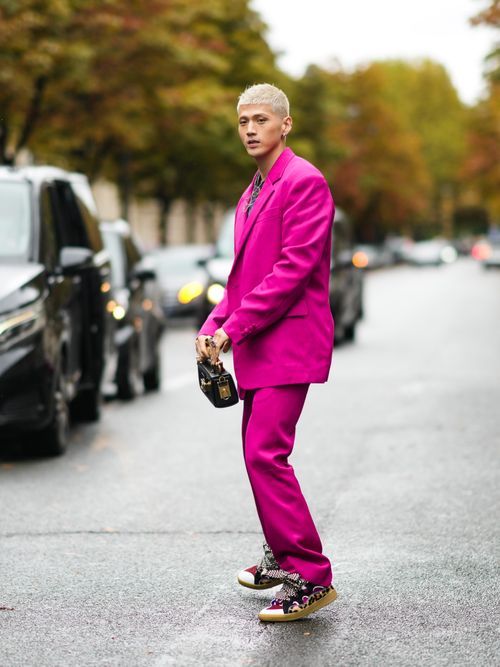 monochrome menswear trend, man wearing pink jacket and pink pants