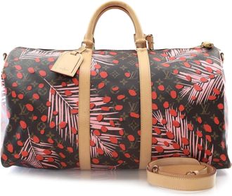 Louis Vuitton Coated Canvas Monogram Jungle Dots Keepall Bandouliere 50