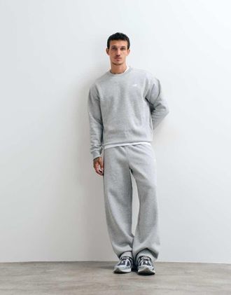 New Balance pantaloni sportivi in pile grigi-Grigio