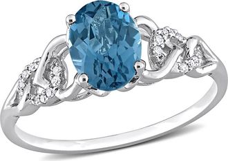 Amour 1 5/8 CT TGW Oval London Blue Topaz and Diamond Accent Link Ring In 10K White Gold